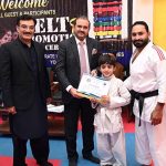 Director of Institute of Food Science Prof. Dr. Anjum Murtaza and Coach Muhammad Naeem Khan distributes certificates to the players during the belt promotion ceremony at Karate Academy, University of Sargodha.