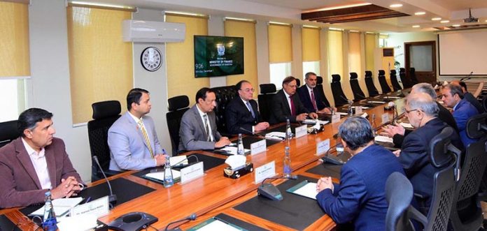 Federal Minister for Finance and Revenue, Senator Muhammad Aurangzeb holding a meeting with a delegation led by Mr. Jean Bouquot, President of the International Federation of Accountants (IFAC), accompanied by Mr. Ashfaq Yousaf Tola, President of the South Asian Federation of Accountants (SAFA), and Mr. Ghulam Mustafa Qazi, President of the Institute of Cost and Management Accountants of Pakistan (ICMAP), at the Finance Division