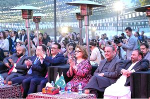 Federal Minister for Communications Abdul Aleem Khan & Tajikistan's Minister for Culture Ms. Sattoriyon Matlubakhon Amonzoda exchanging souvenirs at Pak-Tajik Cultural Program at Lok Virsa.