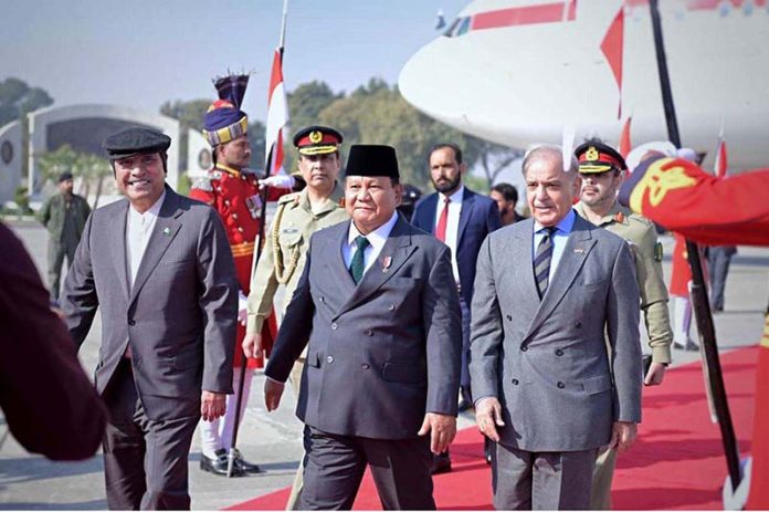 President Asif Ali Zardari and Prime Minister Muhammad Shehbaz Sharif welcoming the President of Indonesia H.E. Prabowo Subianto upon his arrival at Noor Khan Base