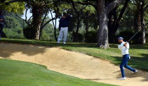 A golfer takes a shot during the 29th CNS Open Golf Championship 2024 at Karachi Golf Club.