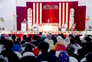 Christian Community members performing religious rituals on Christmas Day at Church.