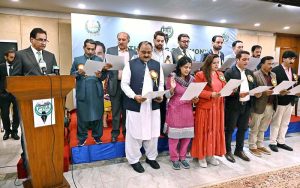 Speaker National Assembly Sardar Ayaz Sadiq administering oath to newly elected members of Parliamentary Reporter's Association during the oath-taking ceremony at Parliament House
