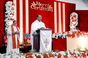 Christian Community members performing religious rituals on Christmas Day at Church.