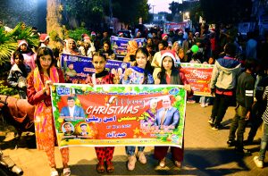 Girls ,women and children of the Christian community participate in a Christmas peace rally ahead of the festive celebrations at Press Club Road.