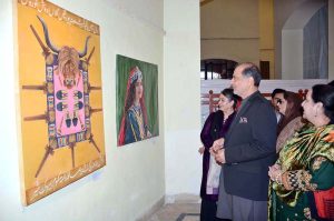 Commissioner Faisalabad Division Raja Jahangir Anwar and Prof. Dr. Kanwal Ameen (T.I.), Vice Chancellor of GCWUF, cutting ribbon to inaugurate a painting exhibition organized by Government College Women University Faisalabad at Punjab Art Council.