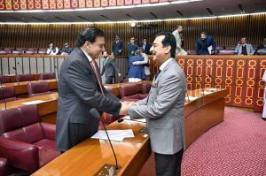 Chairman Senate, Syed Yousaf Raza Gilani shaking hands with Pervez Ashraf, Former Prime Minister during Joint Session of Parliament at Parliament House 