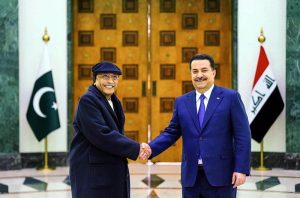 President Asif Ali Zardari shaking hands with Mr Mohammed Shia Al-Sudani, Caretaker Prime Minister of Iraq at Government Palace.
