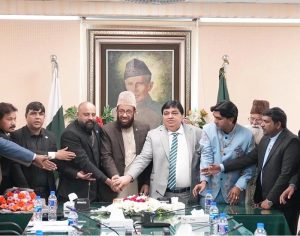 Federal Minister for Religious Affairs and Inter-Faith Harmony Sardar Muhammad Yousaf cutting the Christmas cake along with the Christian Religious leaders during the Christmas celebrations organized at the Ministry of Religious Affairs and Inter-Faith Harmony.