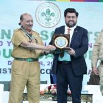 Provincial Commissioner Justice (Retd) Hassan Feroze presenting a shield to Governor Sindh and Chief Patron Kamran Khan Tessori on behalf of the institution.