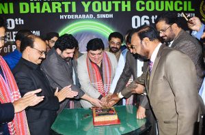 State Minister for Religious Affairs and Interfaith Harmony, Kheel Das Kohistani with people cutting the birthday cake of Quaid-e-Azam Muhammad Ali Jinnah during 6th Jinnah Awards Ceremony at Press Club.