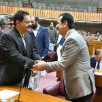 Chairman Senate, Syed Yousaf Raza Gilani shaking hands with Sardar Nabil Ahmed Gabol during Joint Session of Parliament at Parliament House