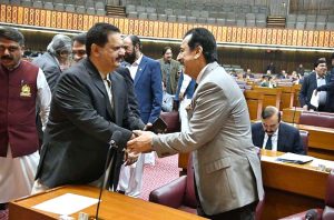Chairman Senate, Syed Yousaf Raza Gilani shaking hands with Sardar Nabil Ahmed Gabol during Joint Session of Parliament at Parliament House