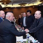 President Asif Ali Zardari shaking hands with Governor of Karbala, Dr. Nsayif Jassim Al‑Khatabi, during a lunch hosted in his honour.