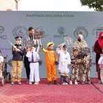 Young children perform a tableau for differently-abled persons during a ceremony marking the International Day of Persons with Disabilities, organized by the Paraplegic Centre Peshawar in collaboration with the International Committee of the Red Cross