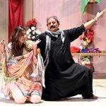 Artists performing in the drama “ Mela Naseeban Ja ” during Drama Festival at Z.A. Bhutto Open Air Theater, Arts Council.