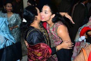 Christian community members performing religious rituals on Christmas Day at St. Thomas Church.