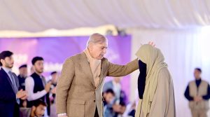 Prime Minister Muhammad Shehbaz interacts with the beneficiaries of the Prime Minister Laptop Scheme.