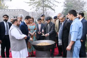 President Asif Ali Zardari opening the Tajik Pilaf (Pulao) at the inauguration ceremony of the Tajikistan Cultural Week at PNCA.