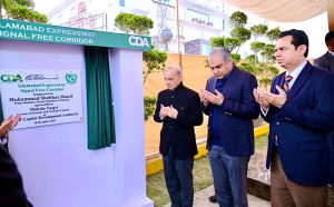Prime Minister Muhammad Shehbaz Sharif unveils the plaque of inauguration of Iqbal Flyover/T-Chowk Flyover and Islamabad Expressway Signal Free Corridor.