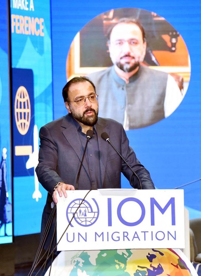 Federal Minister for Overseas Pakistanis and HRD, Chaudhry Salik Hussain addressing the event regarding International Day for Migrants