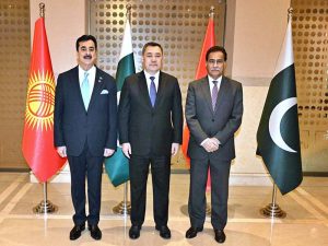 Chairman Senate, Syed Yousaf Raza Gilani shaking hands with president of the Kyrgyz Republic, Sadyr Japarov.