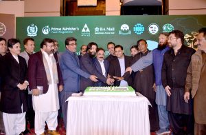 Parliamentary Secretary for Minority Affairs Sanjay Kumar along with others cutting cake on occasion of birth anniversary of Quaid-e-Azam Muhammad Ali Jinnah.