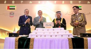 Prime Minister Muhammad Shehbaz Sharif cuts cake at a ceremony of the national day of the United Arab Emirates