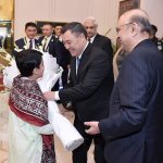 A bouquet being presented to the President of the Kyrgyz Republic, Sadyr Zhaparov, upon his arrival at Aiwan-e-Sadr.