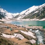 Snow blanketed Naran-Kaghan valleys captivates tourists amid playful hide and seek of sun and rain at Saiful Malook lake
