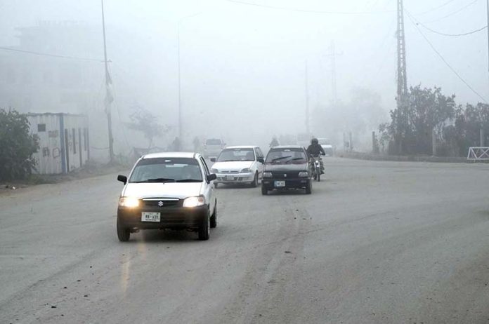 A view of thick fog that engulfs the whole city during early morning in Federal Capital