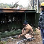 IESCO workers busy repairing a faulty electricity supply line neaer Zero point in the Federal Capital.