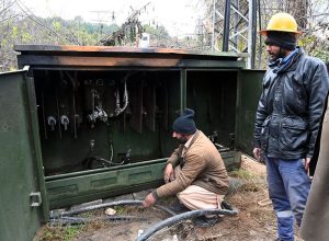 IESCO workers busy repairing a faulty electricity supply line neaer Zero point in the Federal Capital.