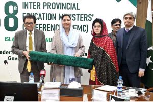 Federal Minister for Federal Education and Professional Training, Dr. Khalid Maqbool Siddiqui presenting souvenir to the participants during 38th Inter Provincial Education Ministers' Conference (IPEMC) at AIOU