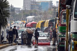 Traffic police stop vehicles heading towards Murree on the Murree Expressway and GT Road due to heavy snowfall, to ensure public safety.