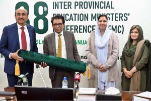 Federal Minister for Federal Education and Professional Training, Dr. Khalid Maqbool Siddiqui presenting souvenir to the participants during 38th Inter Provincial Education Ministers' Conference (IPEMC) at AIOU
