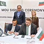 Managing Director Associated Press of Pakistan (APP) Muhammad Asim Khichi and Director General of Bulgarian News Agency (BTA) Kiril Valchev ink the Memorandum of Understanding on news cooperation on behalf of their respective news agencies. Secretary for Information and Broadcasting Ashfaq Khalil and Ambassador of Bulgaria Irena Gancheva witness the signing of the document.