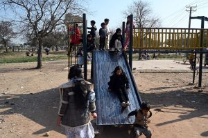 Children enjoy jumping on trampoline at a local park in the Federal Capital