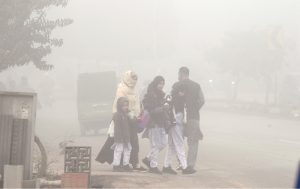A dense blanket of fog envelops the entire Federal Capital during the early morning hours as children head to school amid low temperatures