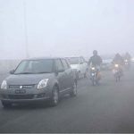 A view of thick fog that engulfs the whole city during early morning time