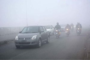 A view of thick fog that engulfs the whole city during early morning time