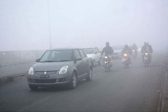 A view of thick fog that engulfs the whole city during early morning time