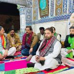 Federal Minister for National Heritage and Culture Division Aurangzeb Khan Khichi listening to folk artist after laying wreath on the grave of Hazrat Shah Abdul Latif Bhitai at Bhitshah
