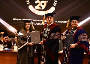 Sindh Minister for Universities and Boards Muhammad Ismail Rahoo presents a certificate to a successful student during the 29th Academic Convocation and Career Fair 2026 at Mehran University of Engineering & Technology, Jamshoro