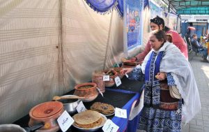 Women visits and observe traditional Saraiki dishes displayed on food stall during Saraiki Culture Day celebrations at the Tea House.