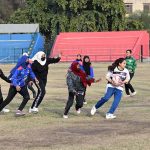 Players give rugby trials during the “Khelta Punjab Pink Games Trials” held at a Sports Stadium, organized by the Sports Department