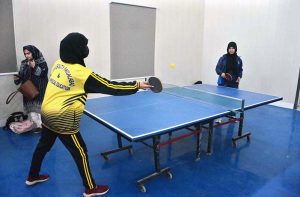 Women players in action during a table tennis match at the Annual Sports Festival of Government College Women University Faisalabad.