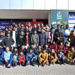 President Divisional Wrestling Association Hafiz Muhammad Aslam in a group photograph with wrestlers during trials of Pakistan National Wrestling Championship, a premier talent hunt program organized by Divisional Wrestling Association at Shahbaz Sharif Sports Complex