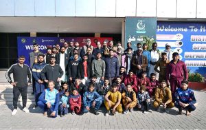President Divisional Wrestling Association Hafiz Muhammad Aslam in a group photograph with wrestlers during trials of Pakistan National Wrestling Championship, a premier talent hunt program organized by Divisional Wrestling Association at Shahbaz Sharif Sports Complex
