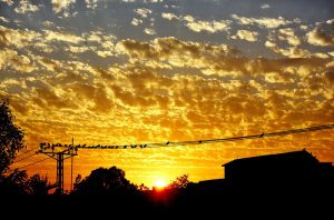 A beautiful view of sunset over the sky in the city.